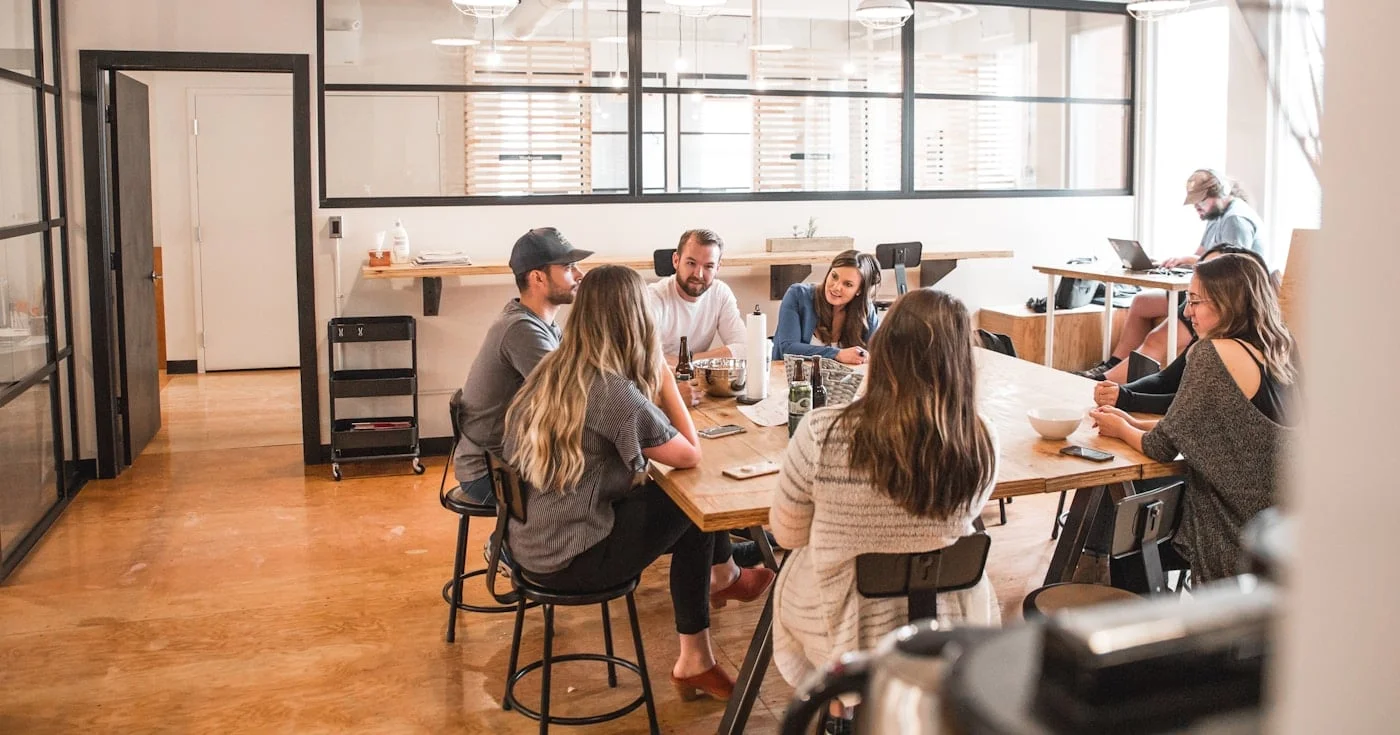 Founders collaborating around a table